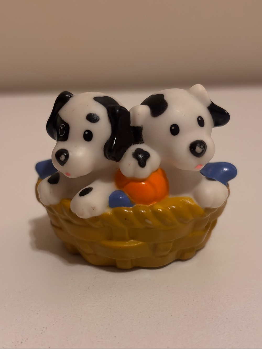 Fisher-Price Little People White and Black Puppy Figurine in Yellow Basket
